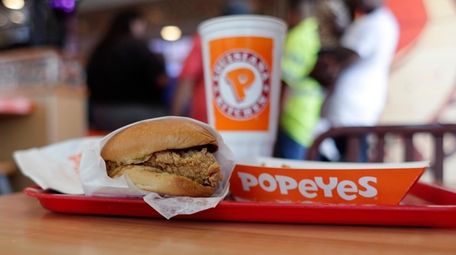 A chicken sandwich is seen at a Popeyes