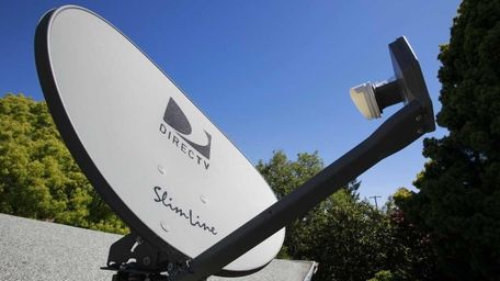 A DirecTV satellite dish is attached to a