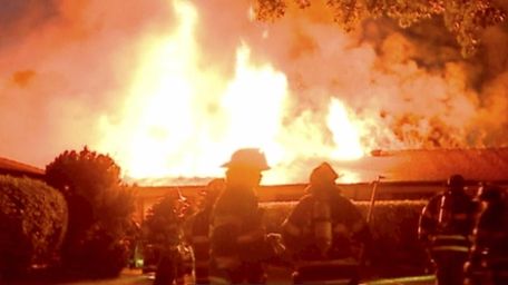 Two firefighters were hurt battling a fire at