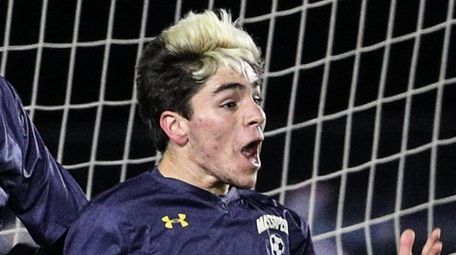 Matt Prusan of Massapequa reacts to scoring the