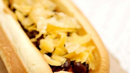 Hot dog with black beans, jack cheese and