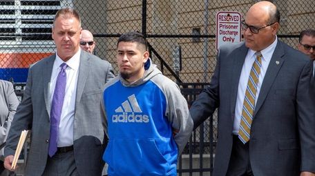 Raul Ponce outside Nassau police headquarters in Mineola