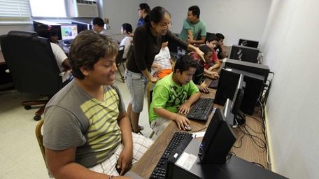 Children use the computer lab as part of