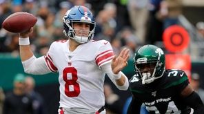 Daniel Jones of the Giants throws a pass