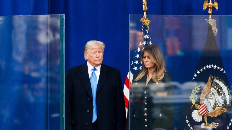 President Trump and First Lady Melania Trump stand