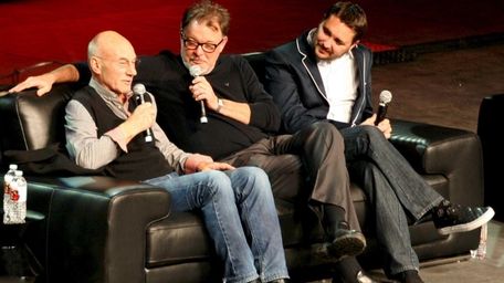 Jonathan Frakes is flanked by Patrick Stewart, left,
