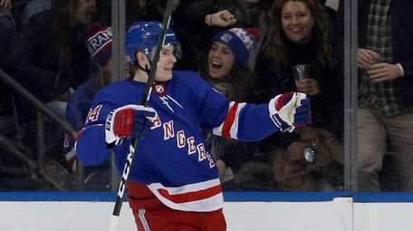 Kaapo Kakko #24 of the Rangers celebrates his