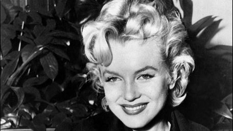 Actress Marilyn Monroe smiles for the camera a