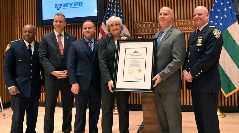 NYPD Commissioner James O'Neill, second from right, and