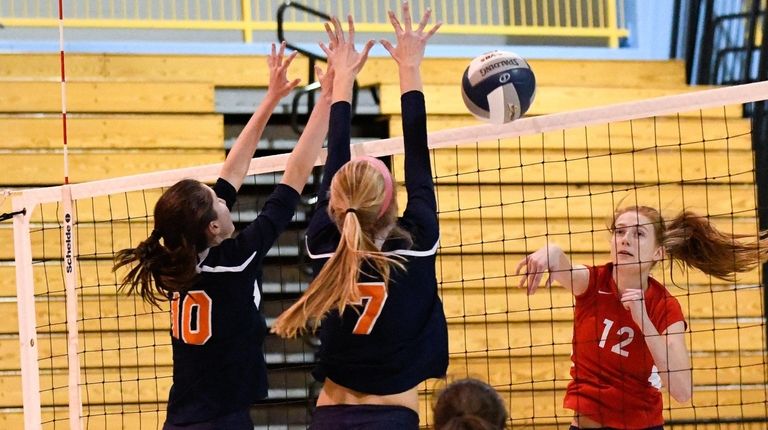 Katelyn Tollefsen of South Side tries to get