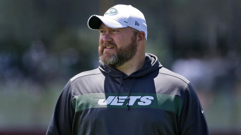 Jets general manager Joe Douglas greets reporters during