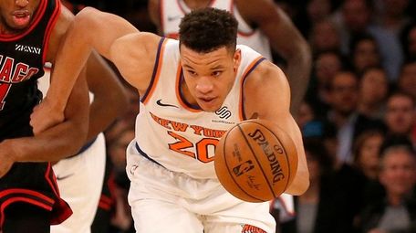 Kevin Knox II of the Knicks steals the