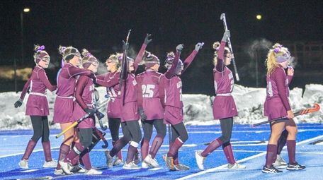 Garden City players celebrate their 1-0 victory over