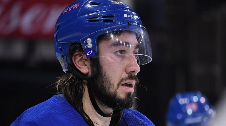 Rangers center Mika Zibanejad looks on before a