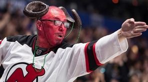 A New Jersey Devils fan wearing face paint