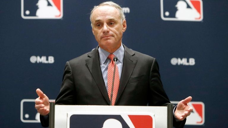 Baseball commissioner Rob Manfred speaks to the media