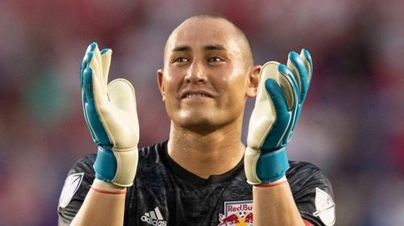Red Bulls goalkeeper Luis Robles applauds fans at