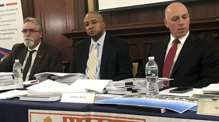 Nassau County IDA members Christopher Fusco, left, Lewis