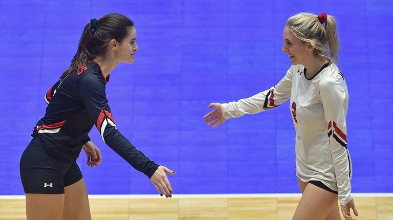 Samantha Cox of Pierson-Bridgehampton, left, with fellow