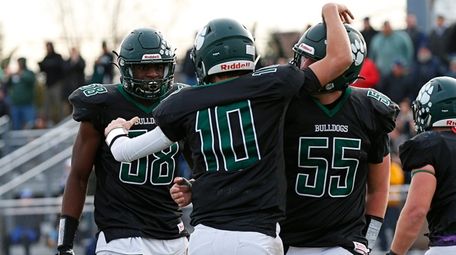 Jack Randazzo of Lindenhurst, center, celebrates after scoring