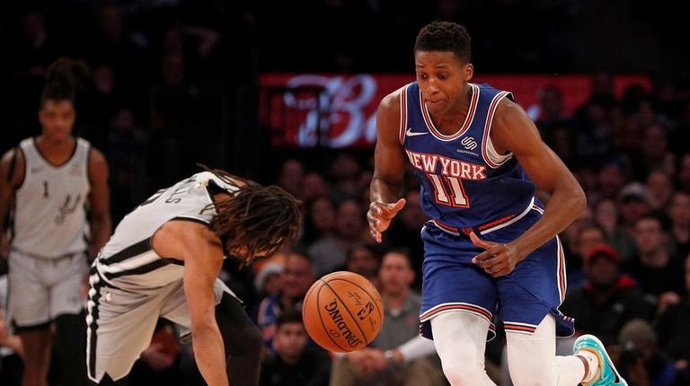 Frank Ntilikina of the Knicks steals the ball