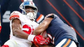 Giants defensive back Corey Ballentine tries to strip