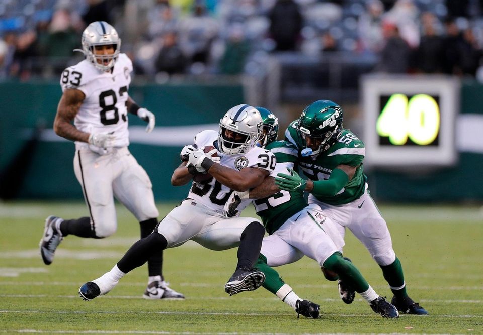 James Burgess #58 and Arthur Maulet #23 of