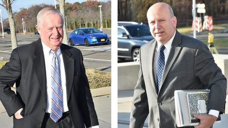 Thomas Spota, left, and Christopher McPartland arrive at