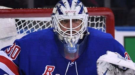 Rangers goaltender Henrik Lundqvist protects the net against