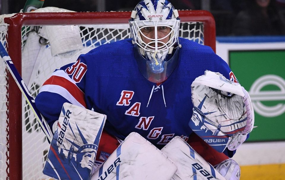 Rangers goaltender Henrik Lundqvist protects the net against
