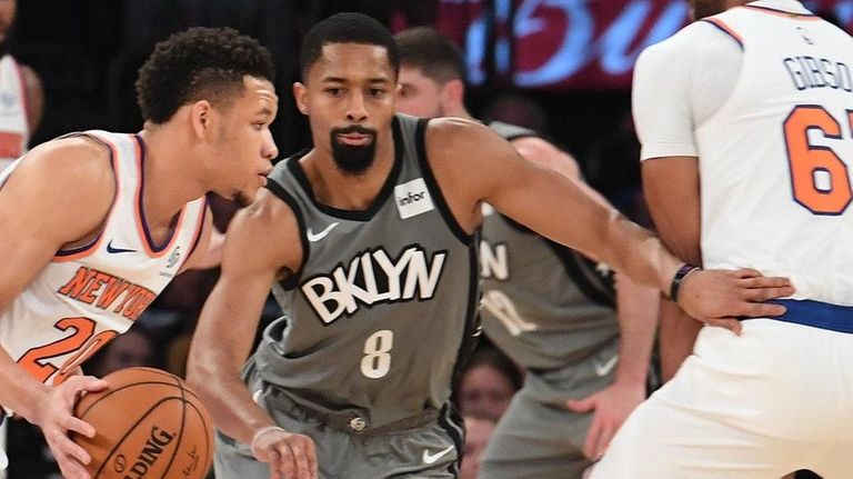 Nets guard Spencer Dinwiddie defends Knicks guard Kevin
