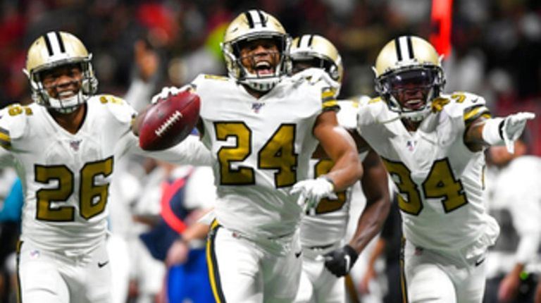 Saints strong safety Vonn Bell celebrates with teammates