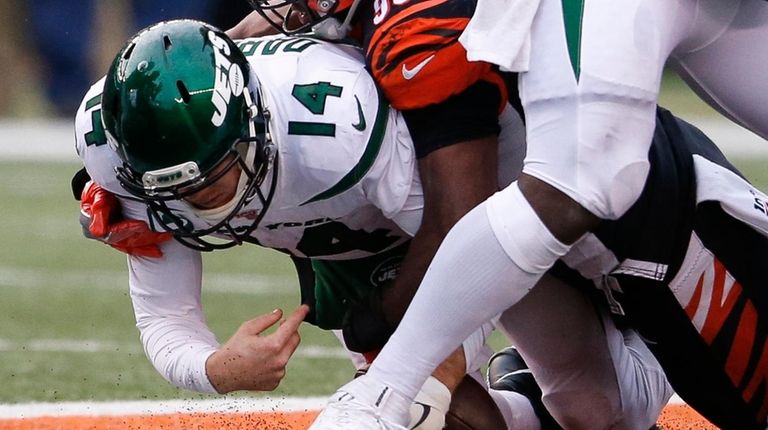 Jets quarterback Sam Darnold is sacked by Bengals