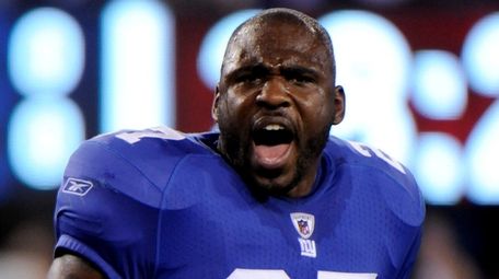 Giants running back Brandon Jacobs  reacts before