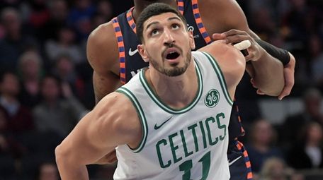 Enes Kanter of the Celtics and Mitchell Robinson