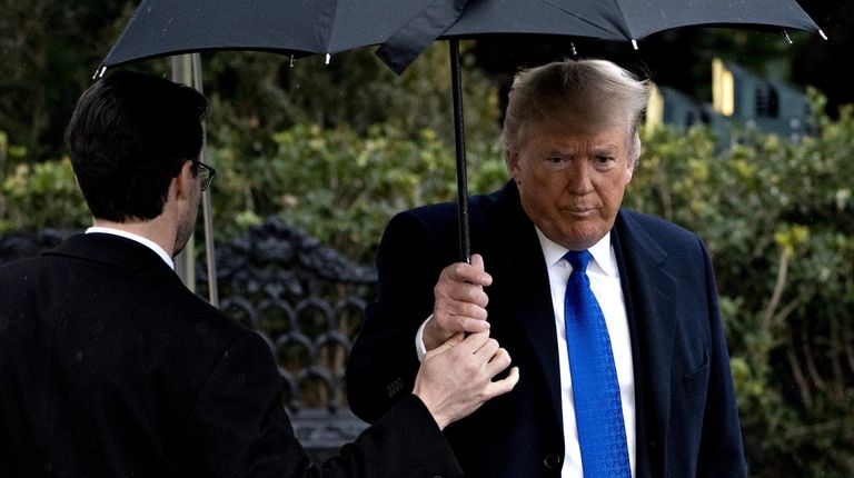 President Donald Trump arrives to speak to members