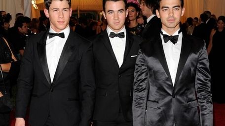 The Jonas Brothers -- Nick, left, Kevin and