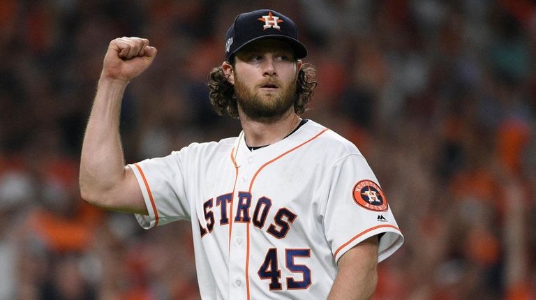 Astros starting pitcher Gerrit Cole reacts after an