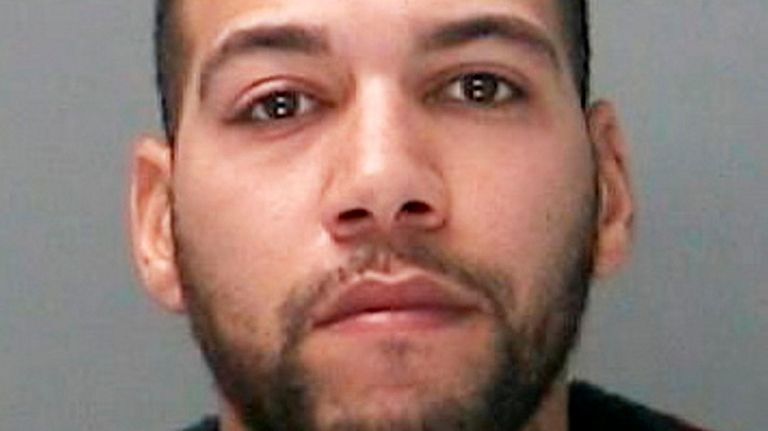 Richard Beltre is seen in this mugshot.