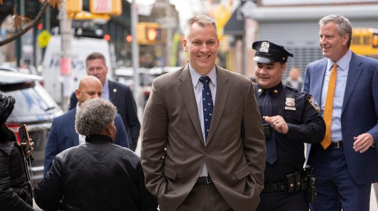 New York City Police Commissioner Dermot Shea, center,