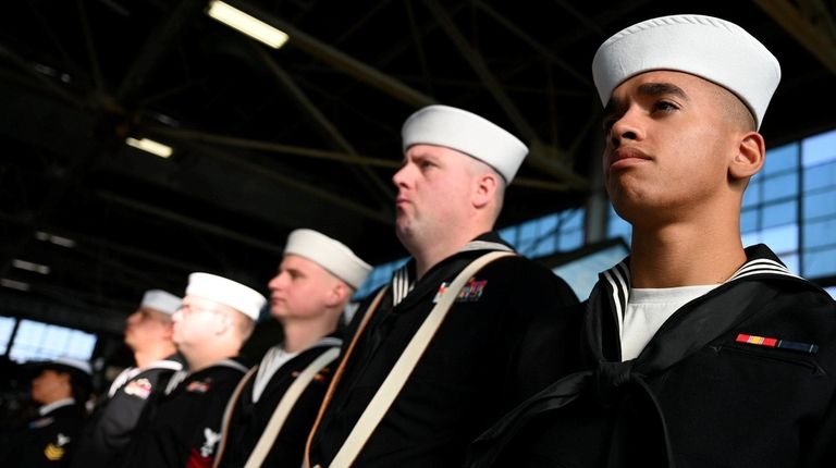 Gideon Sherry, 21, of Farmingdale, right, a Navy