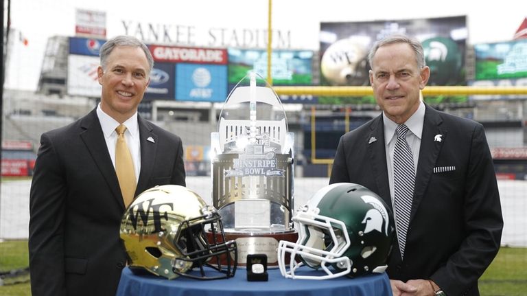 Wake Forest head coach Dave Clawson, left, and