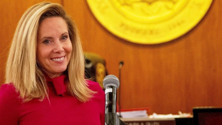 Laura Gillen presides over her last meeting as