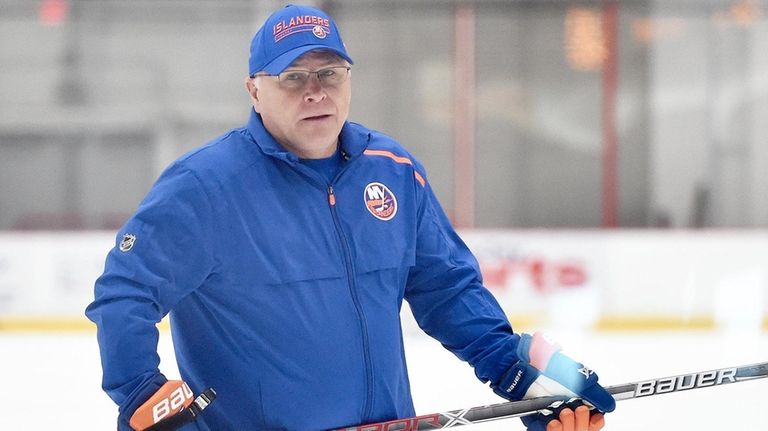 Barry Trotz, Islanders head coach, runs practice at