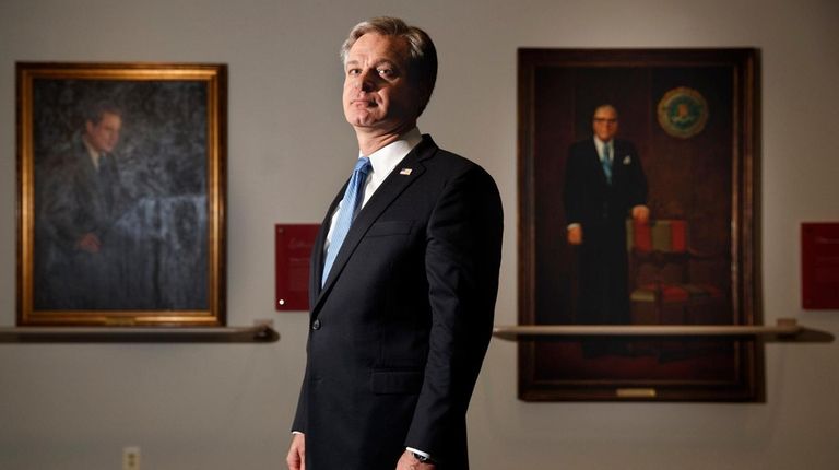 FBI Director Christopher Wray poses for a photo