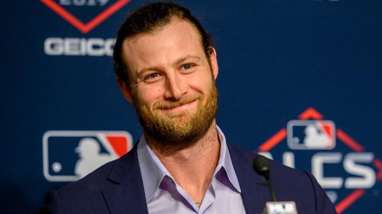 Gerrit Cole speaks to the media at a