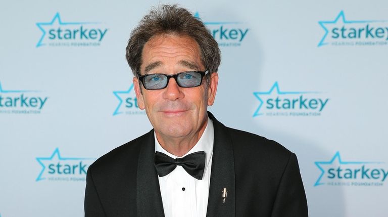 Huey Lewis walks the red carpet at the