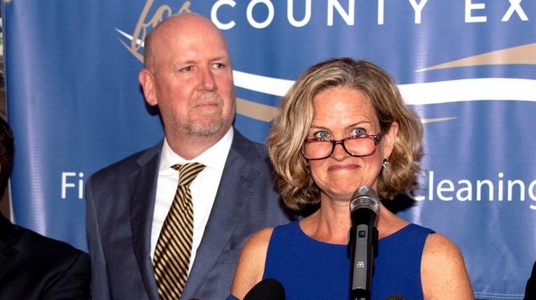 John Curran appears with his wife, now-Nassau County