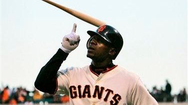 Then-Giants outfielder Fred Lewis celebrates after hitting a
