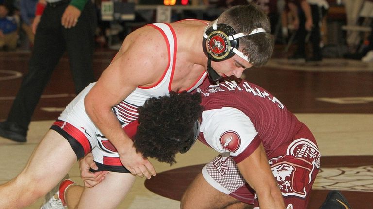 Patchogue Medford's Danny Horton wrestles Bay Shore's Keon